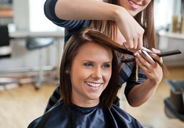 Woman getting a haircut